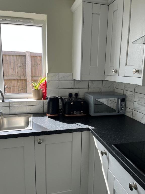 Bluehouse Drive kitchen appliances and worktop