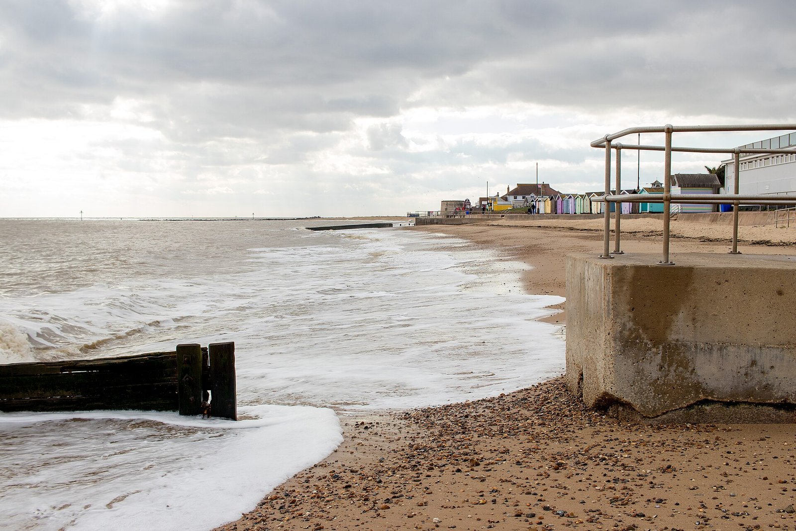 A wide sandy beach and colourful seafront in Clacton-on-Sea